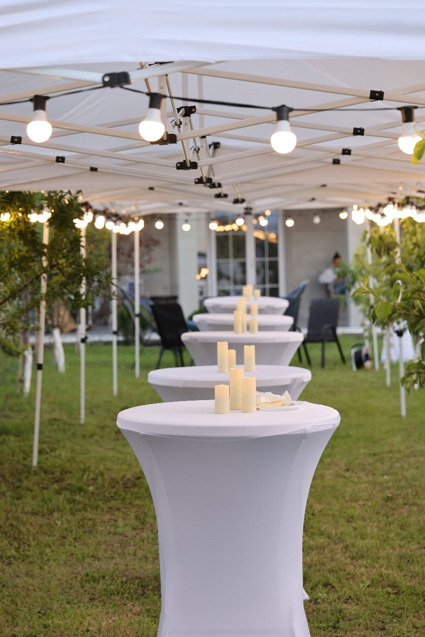 Folding cocktail table with tablecloth